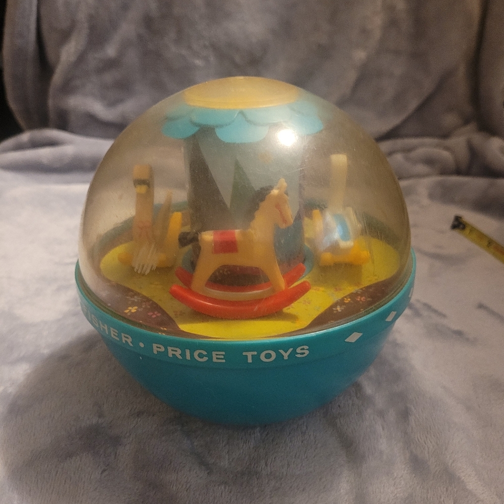 Vintage Fisher-Price Blue and Yellow Rotating Toy